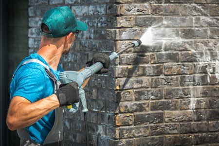 How Professional Pressure Washing Prepares Your Exterior Surfaces For Further Services